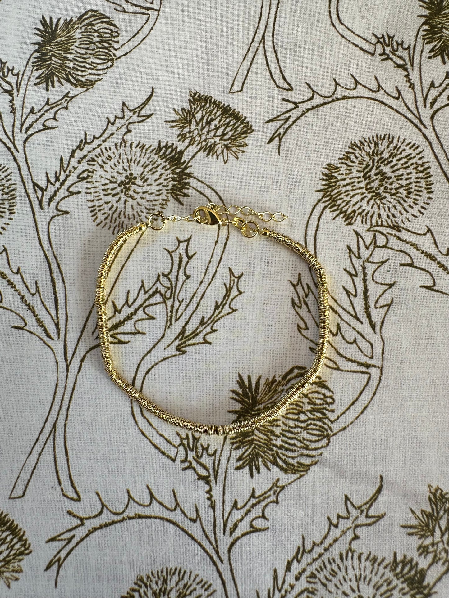 Pulsera argollitas doradas