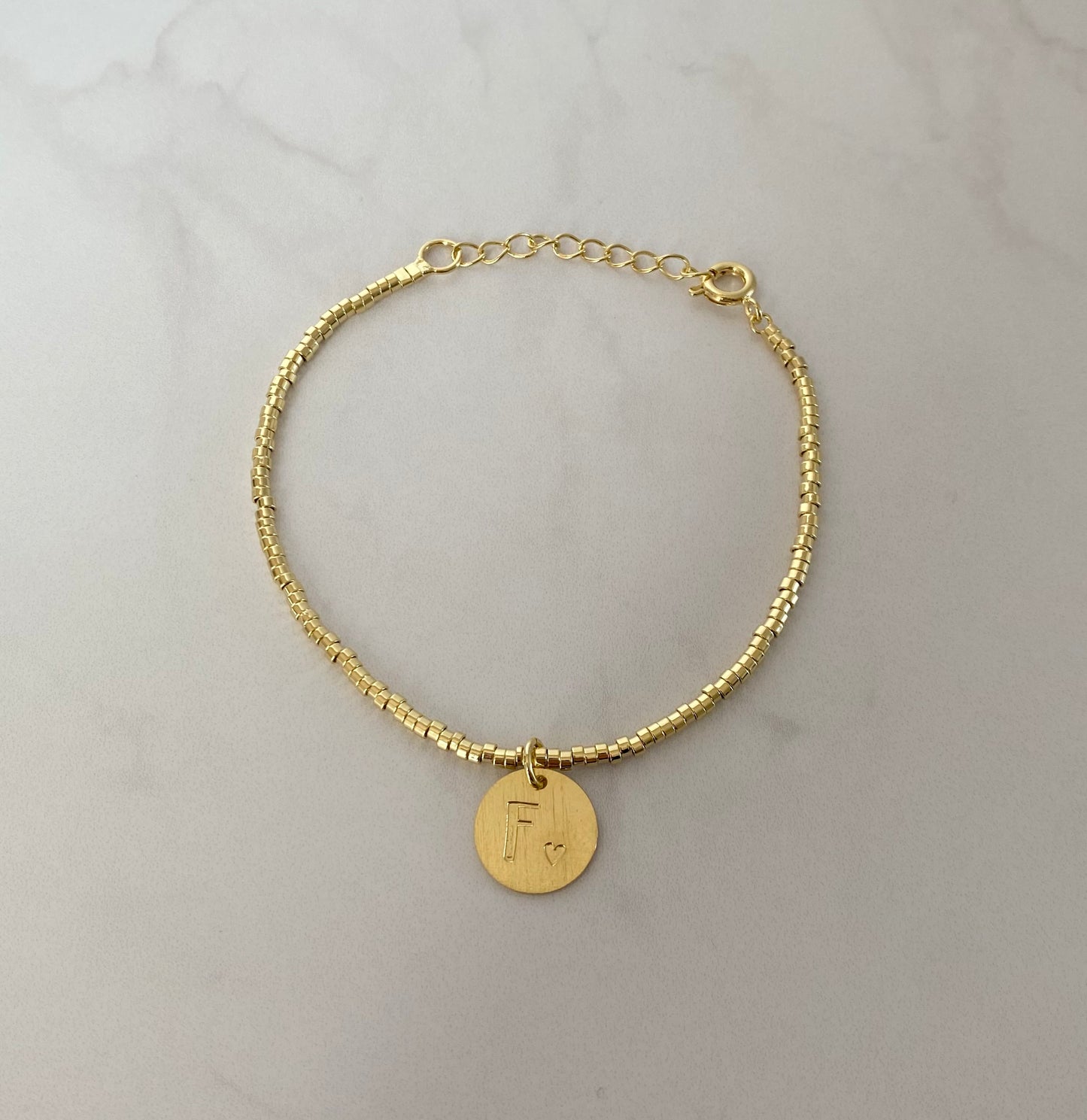 Pulsera de mostacillas & inicial