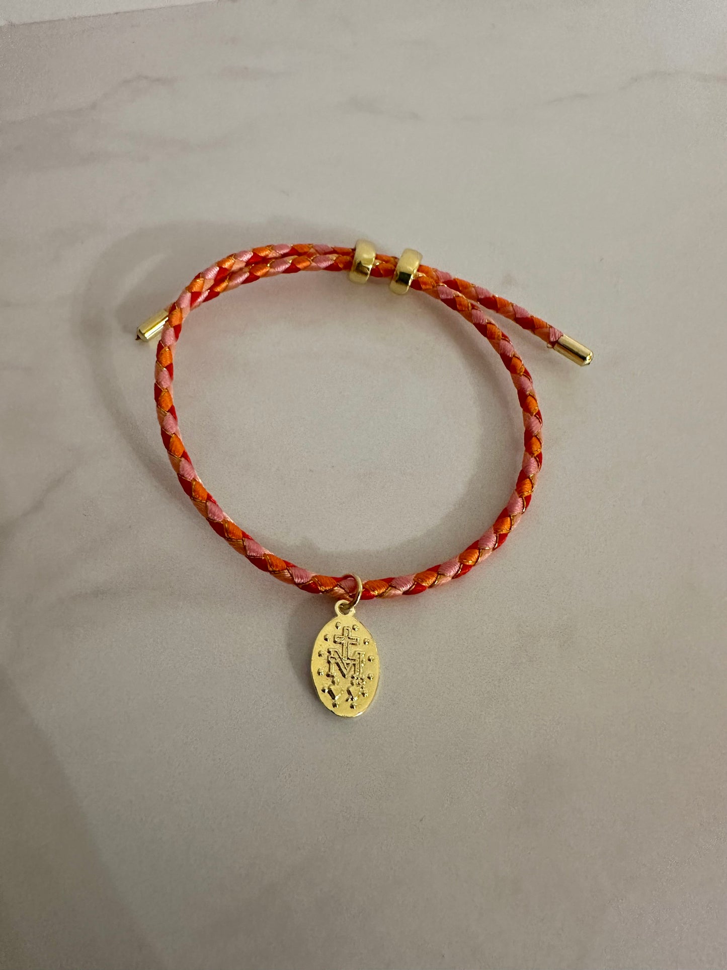 Pulsera colores & Virgen de los Milagros