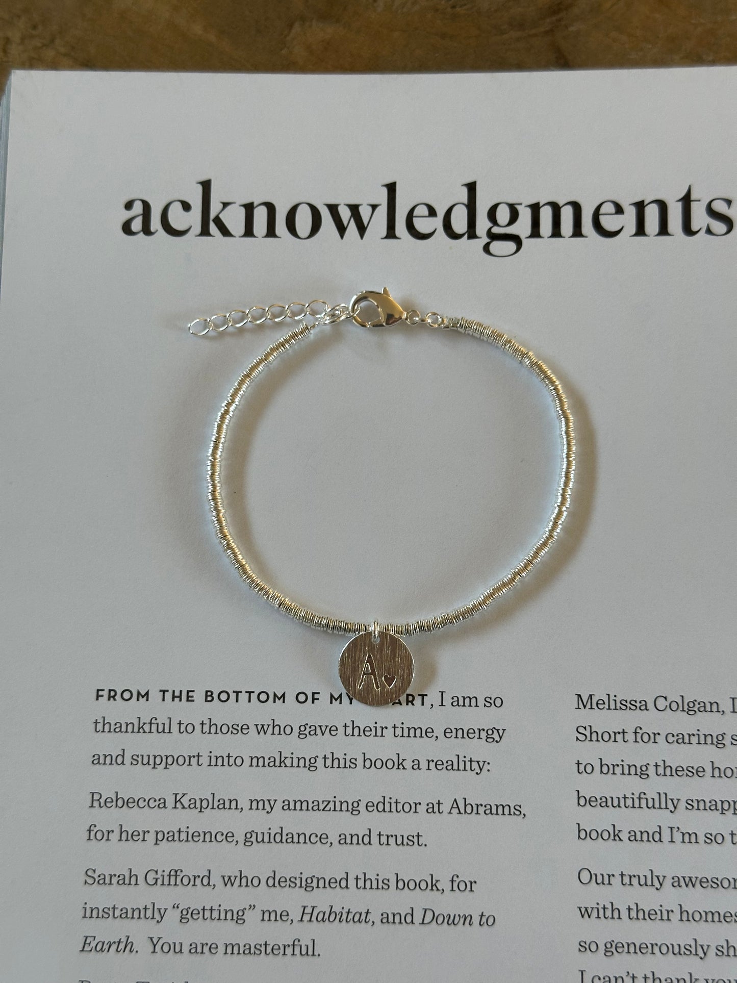 Pulsera inicial plateada