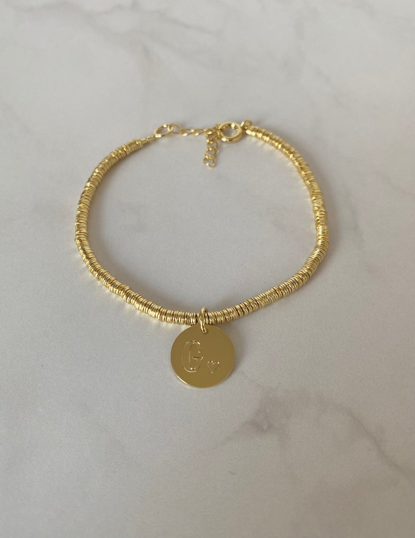 Pulsera inicial argollitas