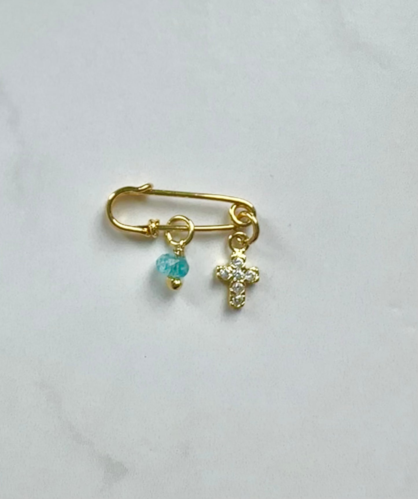 Prendedor protector bebé para ropa o cuna