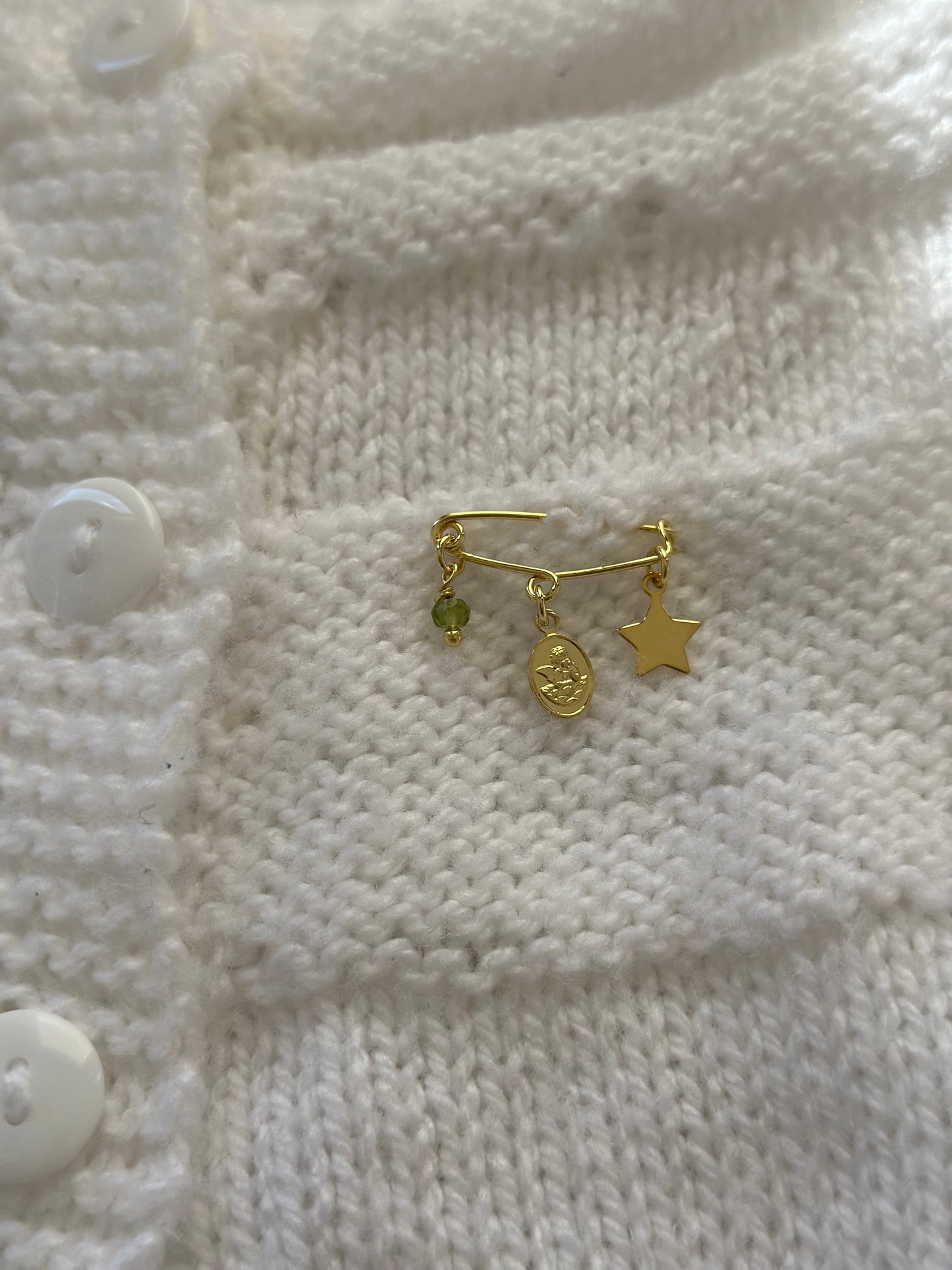 Prendedor protector bebé para ropa o cuna