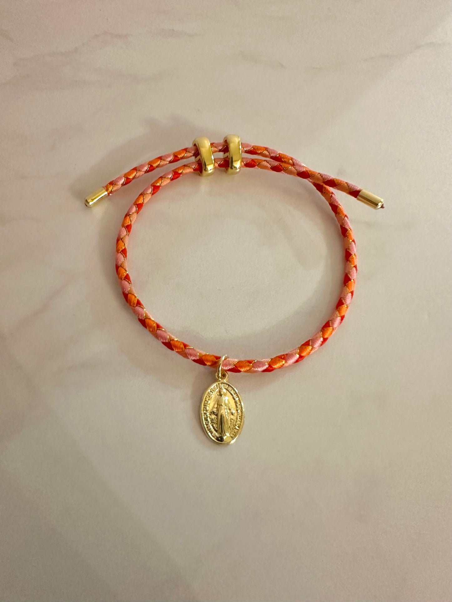 Pulsera colores & Virgen de los Milagros