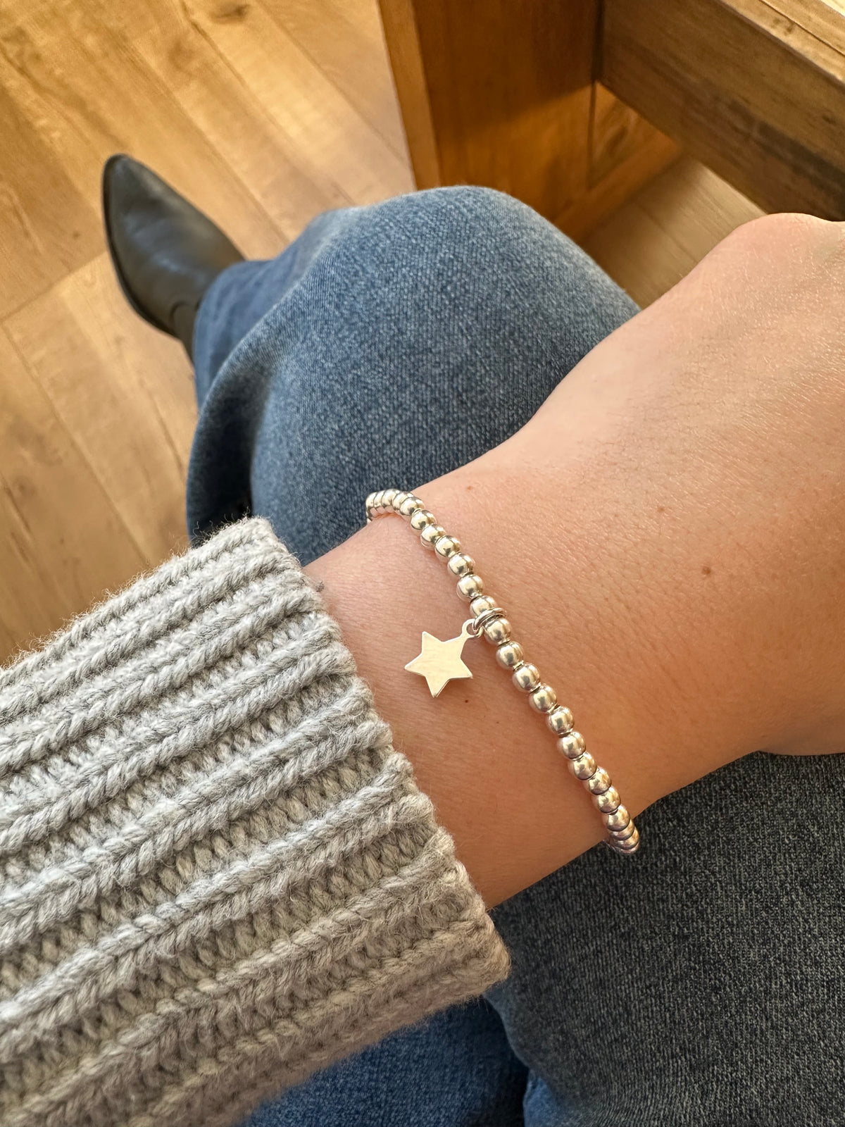 Pulsera mostacillas plateadas