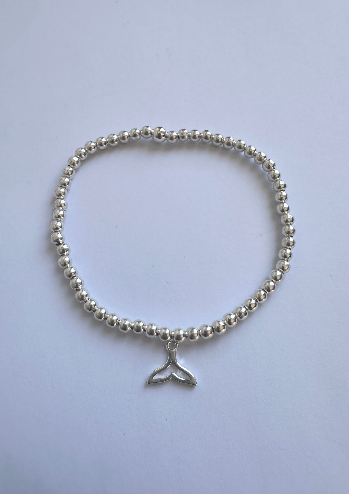 Pulsera mostacillas plateadas